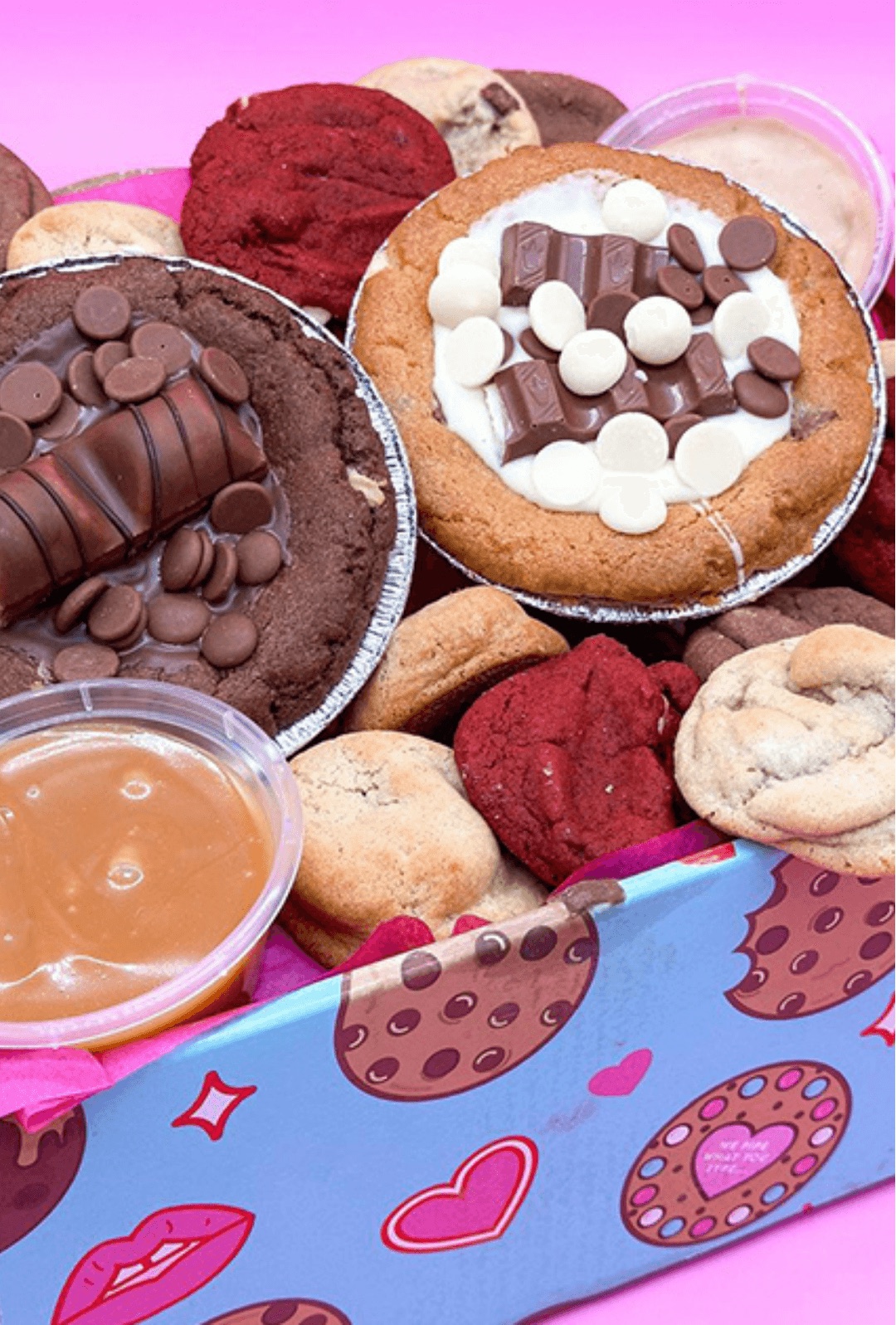 Loaded cookies, a brownie and a caramel dip pot packed into an Ooh & Aah Cookies box